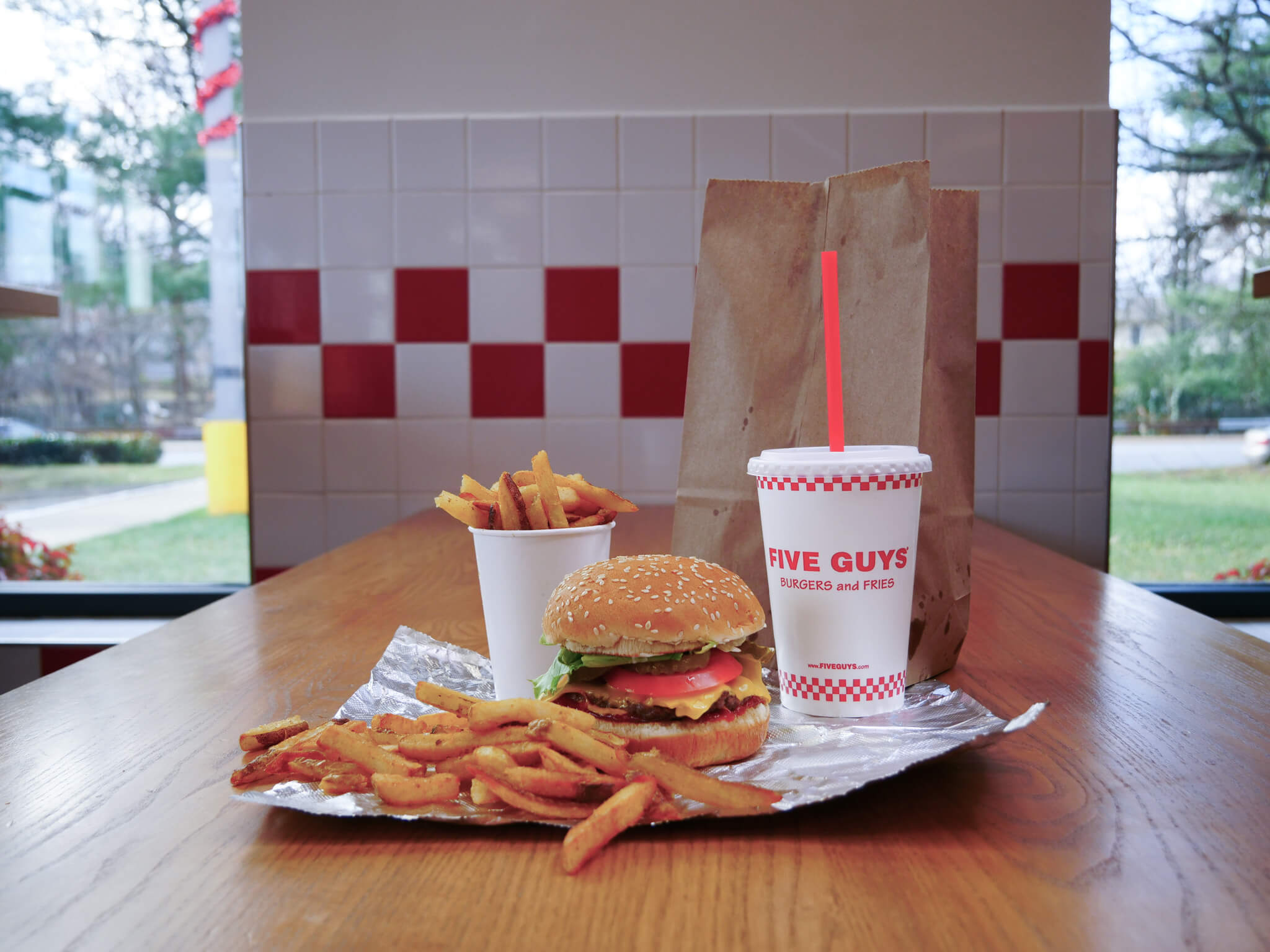 Burger, Fries, & Drink on a Table at Five Guys